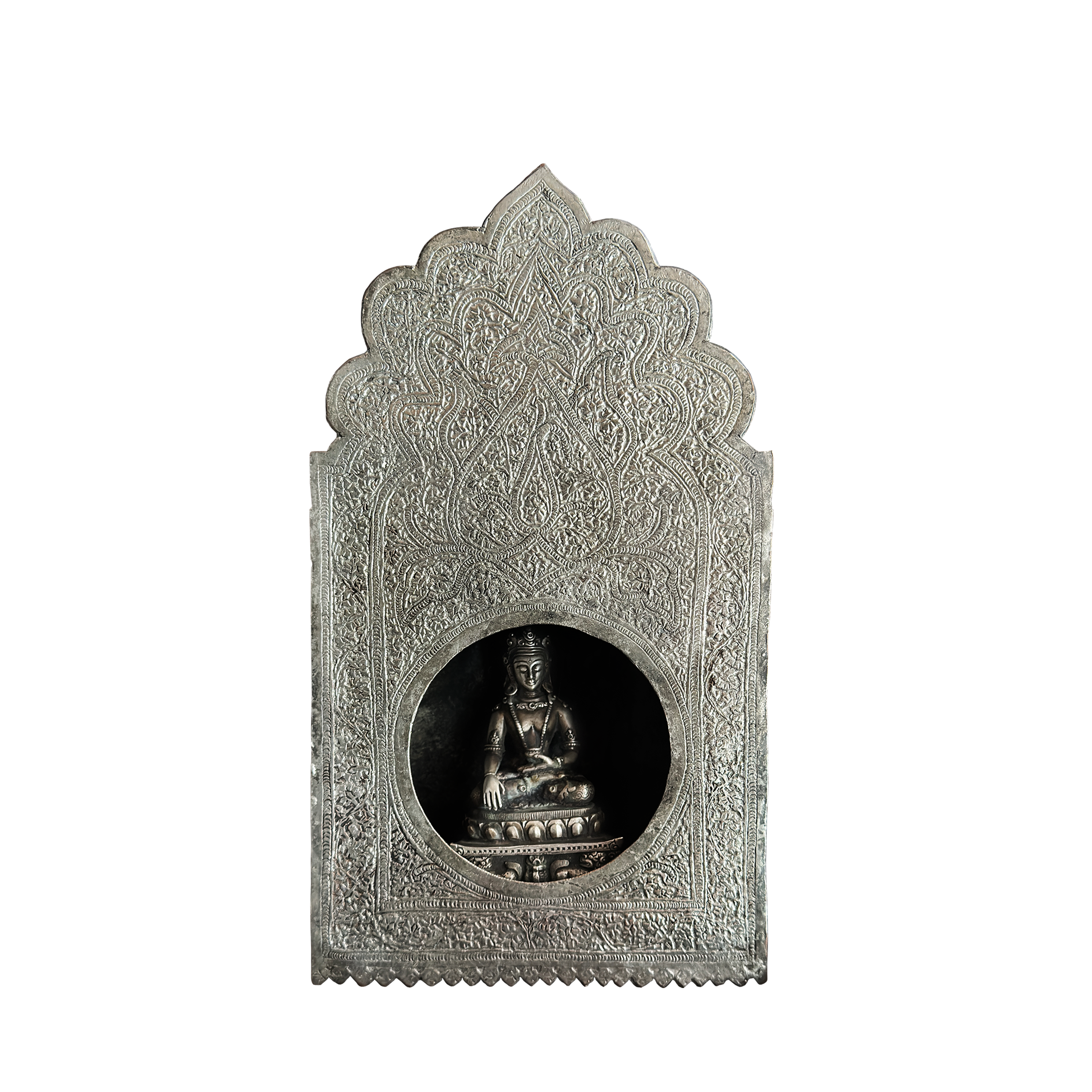 Engraved silver shrine niche holding a seated Buddha